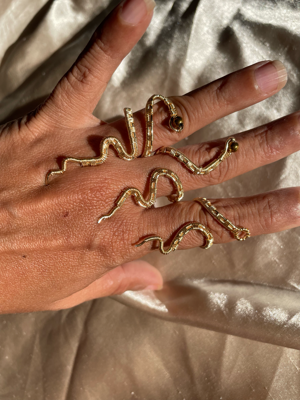 Sortijas serpiente ajustable en alambre AAA non tarnish